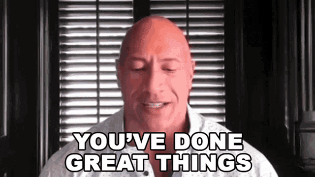 a bald man is saying `` you 've done great things '' in front of a window .