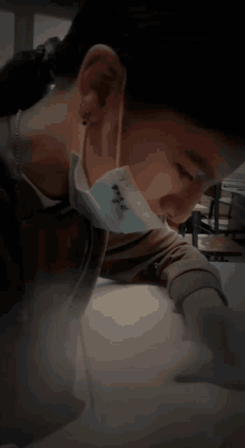 a person wearing a mask that says ' i 'm fine ' on it