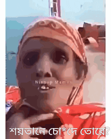 a picture of a woman with a scarf around her head with nispap memes written on the bottom