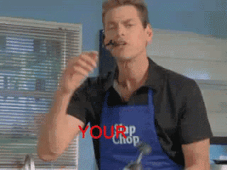 a man wearing a blue apron that says your chop on it