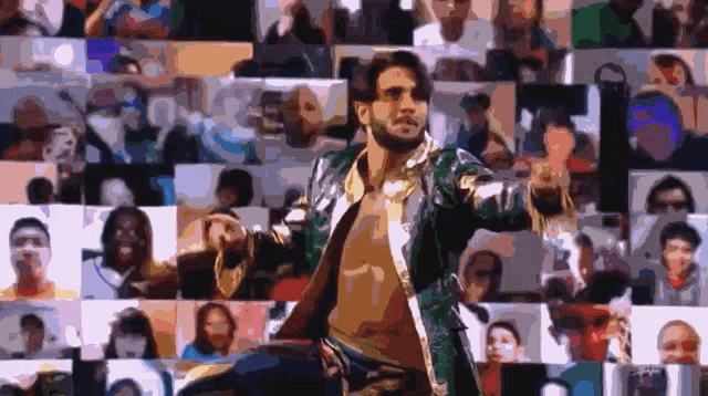a man in a green jacket is dancing in front of a crowd