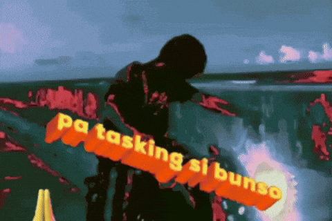 a person is holding a sign that says " pa tasking si bunso "