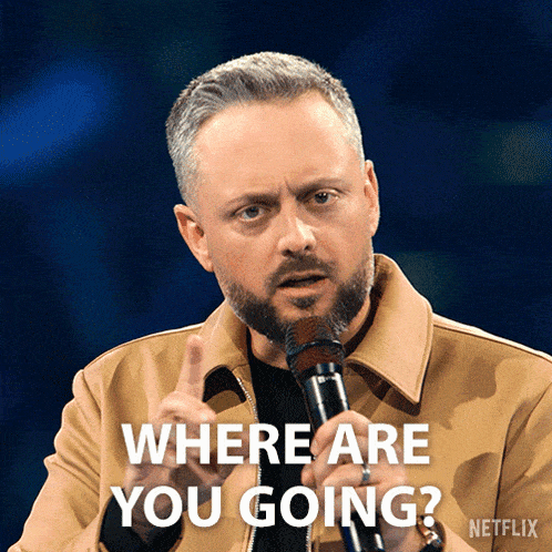 a man holding a microphone with the words where are you going below him