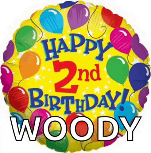 a happy 2nd birthday woody balloon with balloons around it