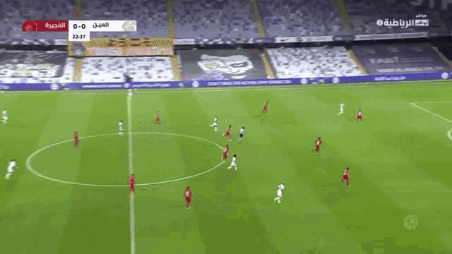 a soccer game is being played on a soccer field