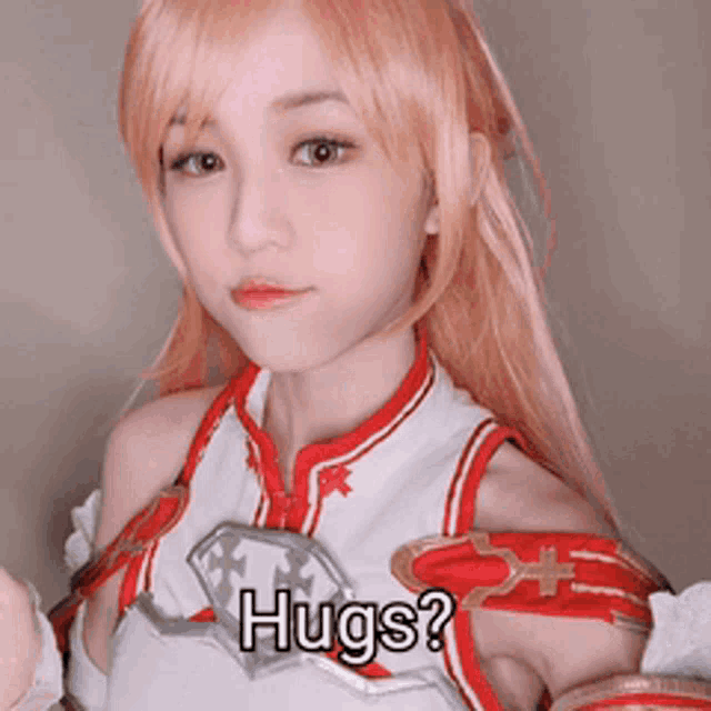 a woman in a red and white costume with the words hugs on her chest