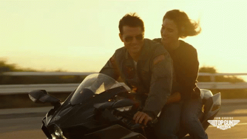 Riding A Motorcycle Pete Mitchell GIF - Riding A Motorcycle Pete Mitchell Maverick GIFs