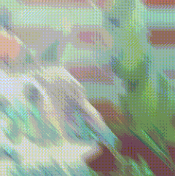 a blurred image of a green and red background with a diagonal striped pattern .