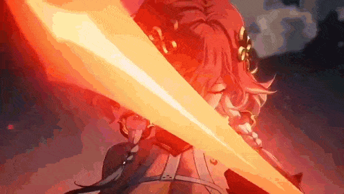 a close up of a person holding a sword in their hand in a video game .