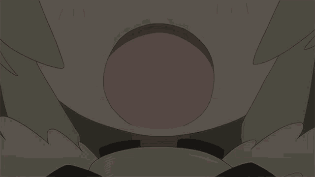 a close up of a cartoon character 's mouth with a pink circle in it