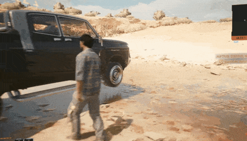 a man is standing in front of a truck that has the word goodbye written on it