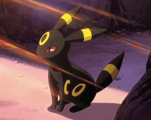 a black and yellow pokemon with the letters co on its back