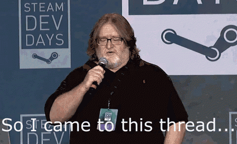a man speaking into a microphone in front of a steam dev days sign