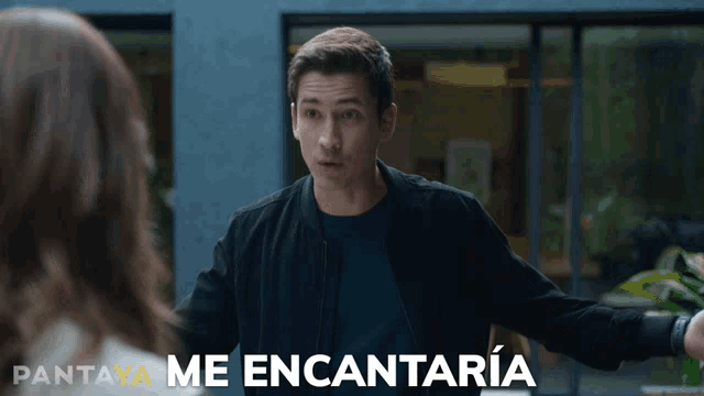 a man in a black jacket is talking to a woman with pantaya me encantaria written on the bottom right
