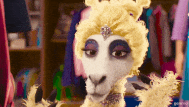 a cartoon llama wearing a yellow wig and makeup