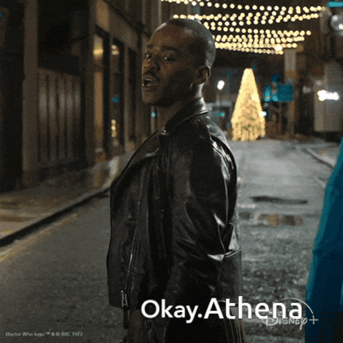 a man in a leather jacket says okay athena on the bottom