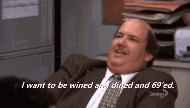a man in a suit and tie is saying i want to be wined and dined and 69 'ed