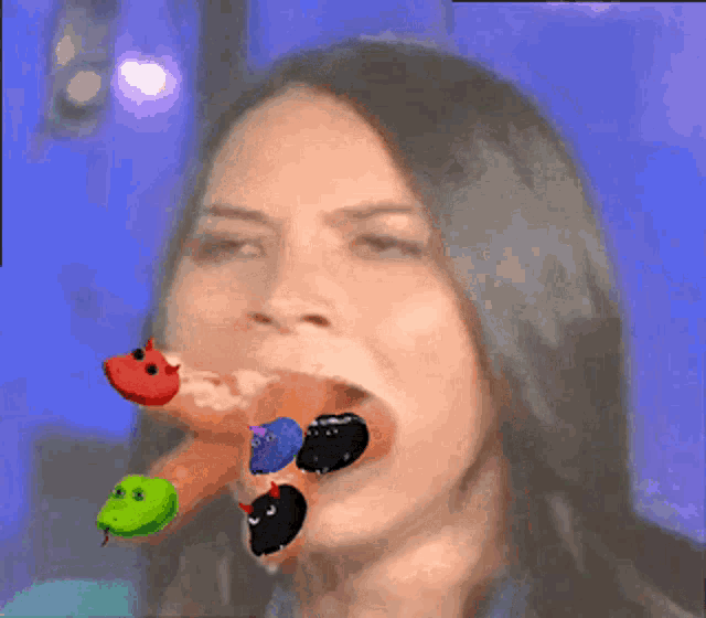 a woman with a bunch of cartoons in her mouth