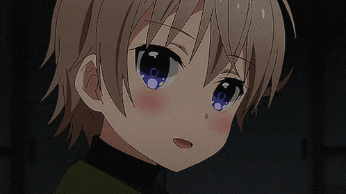 a close up of a girl 's face with a tear coming out of her eye