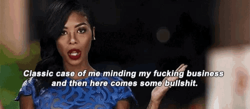 a woman in a blue dress is talking about her fucking business and then there comes some bullshit .