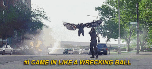 a man is flying through the air with the words # 1 came in like a wrecking ball above him .