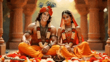 a man and a woman are sitting next to each other in a room