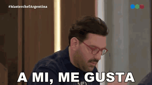 a man with glasses says " a mi me gusta "
