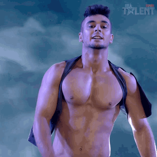 a shirtless man is standing in front of a sign that says get talent