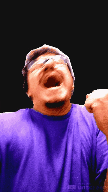 a man in a purple shirt with his mouth open is made with unscreen