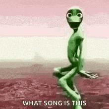 a green alien is sitting on a rock with the words `` what song is this '' behind him .