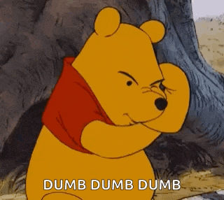 winnie the pooh is making a dumb dumb dumb face while hugging a tree .