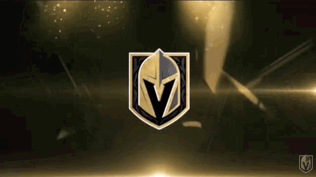 a logo for the golden knights is shown on a dark background