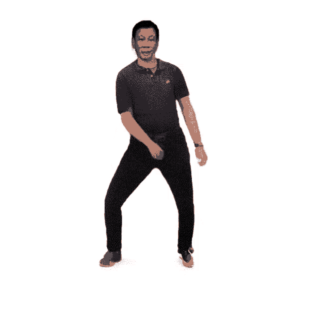 a man in a blue shirt and black pants is dancing .