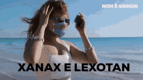 a woman wearing a mask on the beach with the words xanax e lexotan below her