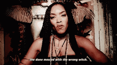 a woman sitting on a throne with the words she done messed with the wrong witch written below her