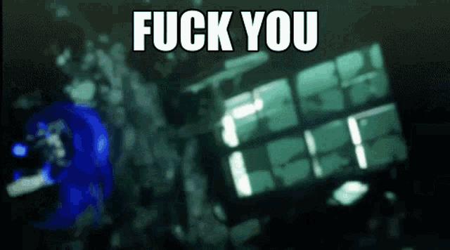 a blurred image with the words " fuck you " in the upper right corner