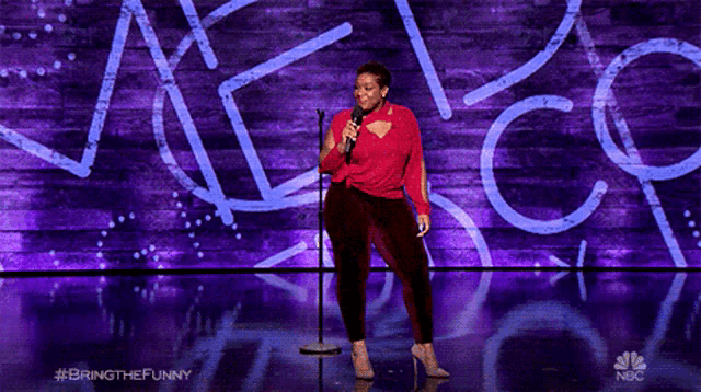 a woman singing into a microphone with the hashtag bringthefunny on the bottom