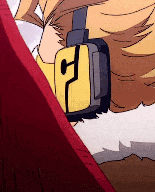 a close up of a cartoon character wearing headphones and a yellow bag .