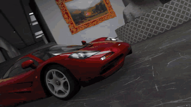 a black sports car with the letter a on the back