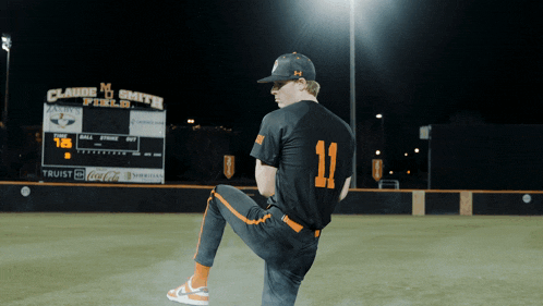 a baseball player with the number 11 on his shirt