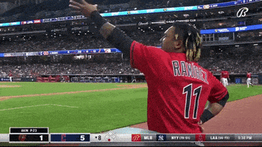 a baseball player with the number 11 on the back of his shirt