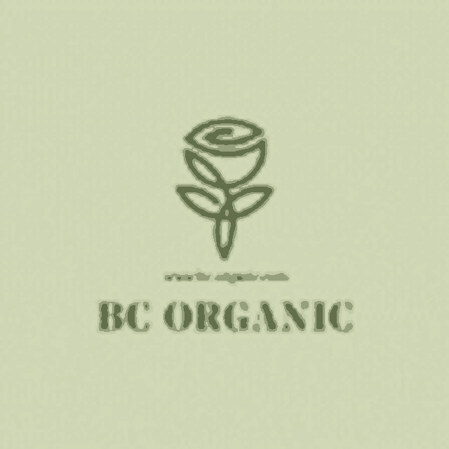 a logo for a company called bc organic with a rose and leaves .