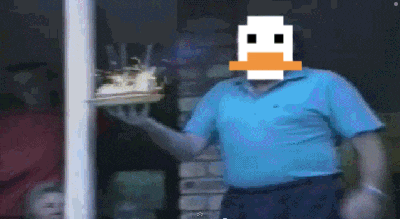 a man in a blue shirt is holding a tray of food with a pixelated duck face on his face