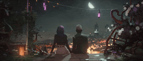 a man and a woman sitting on a balcony looking at the moon