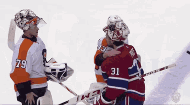 a hockey player with the number 31 on his back