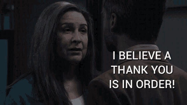 a man and a woman are looking at each other with the words " i believe a thank you is in order " above them
