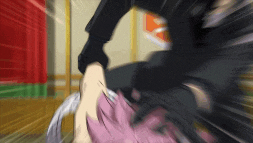 a blurry picture of a person being kicked by another person
