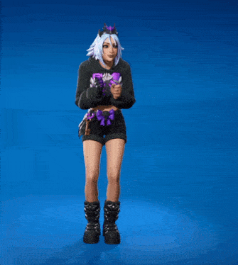 a girl with a crown on her head is holding a purple gift