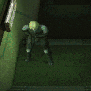 a person laying on the ground in a dark hallway