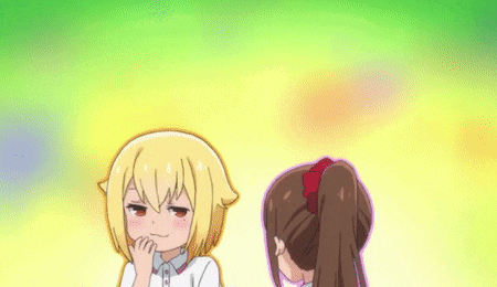 two anime girls are standing next to each other and one of them is making a funny face .